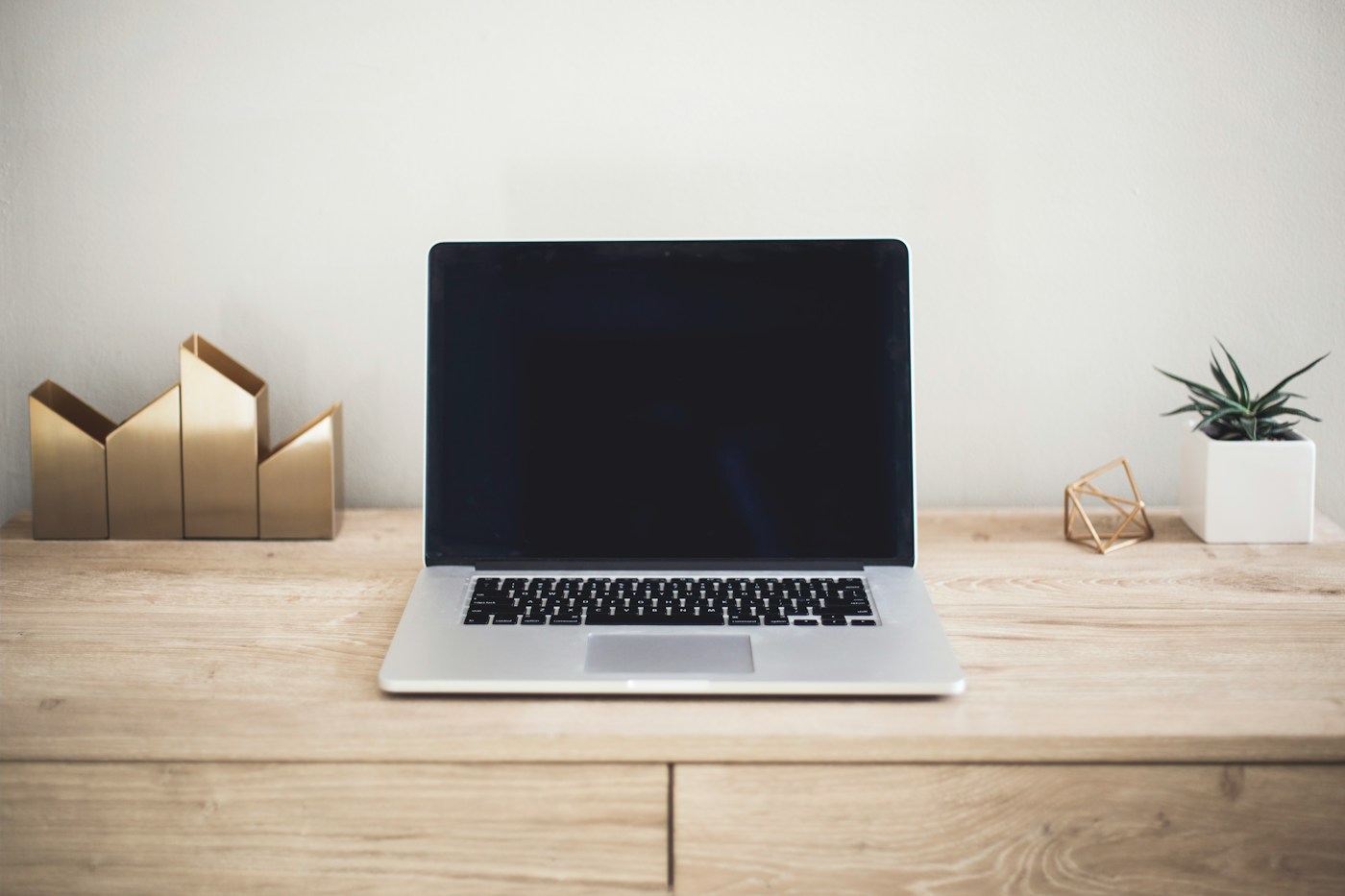 Modern laptop workspace for planning and creating online content